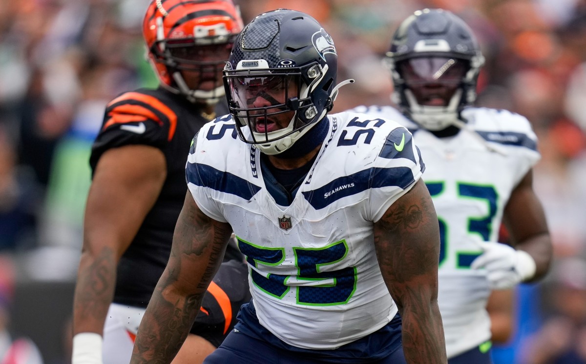 Seattle Seahawks defensive end Dre'Mont Jones (55) celebrates after sacking Cincinnati Bengals quarterback Joe Burrow (9) in the third quarter of the NFL Week 6 game between the Cincinnati Bengals and the Seattle Seahawks at Paycor Stadium in downtown Cincinnati on Sunday, Oct. 15, 2023. 